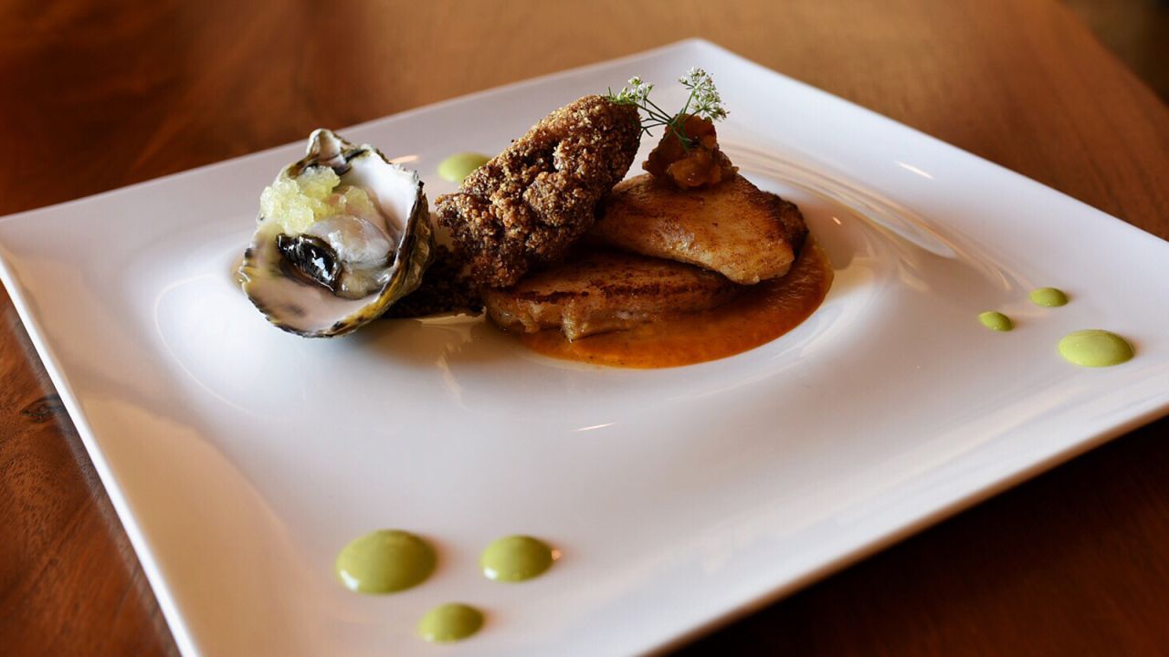Kai, Phoenix, Arizona: Halibut and grey pearl oysters is crusted with red Supai corn.