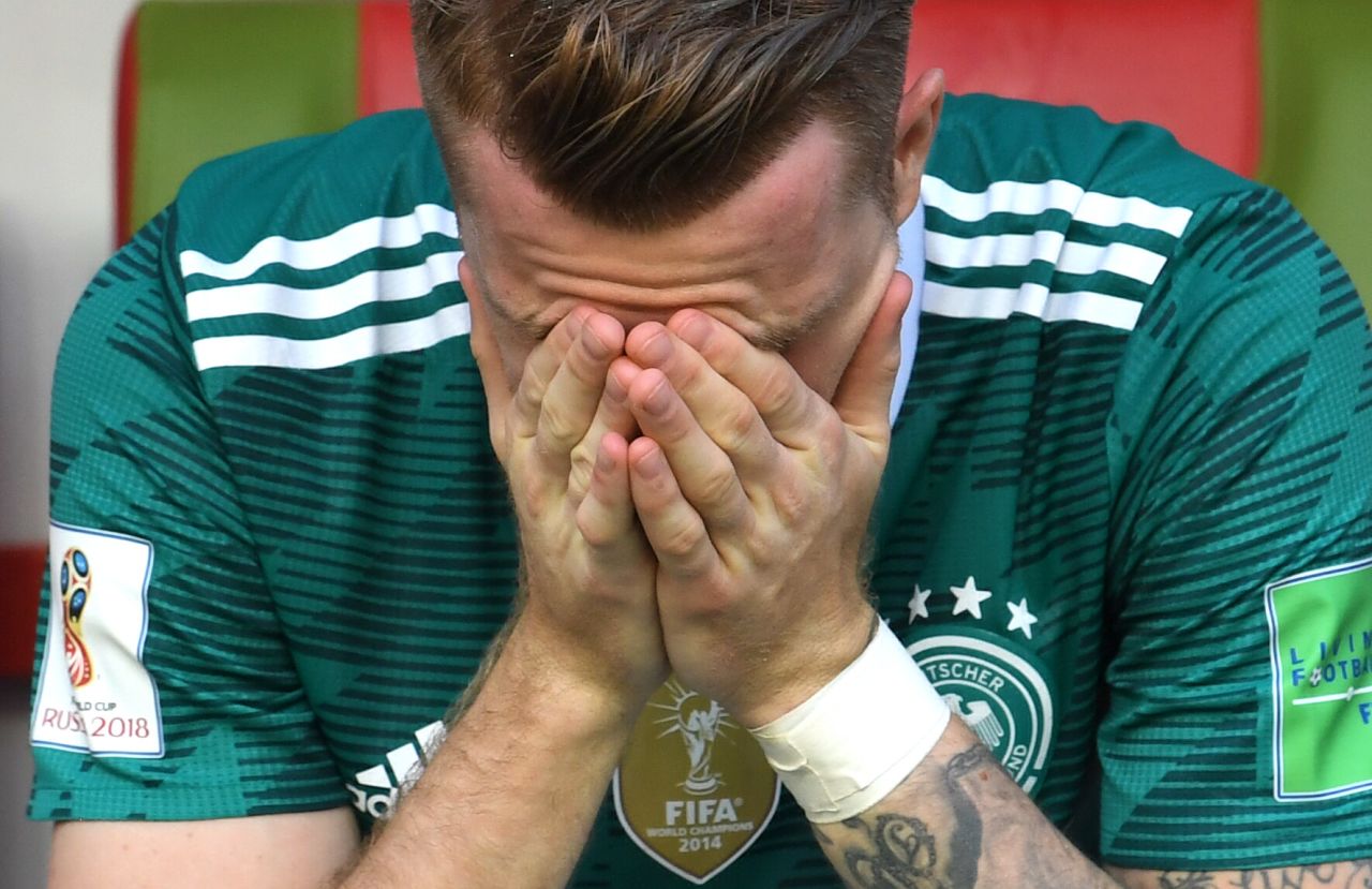 Germany's Marco Reus reacts after his team lost to South Korea and was knocked out of the World Cup on June 27. The defending champions lost 2-0 and finished at the bottom of Group F.