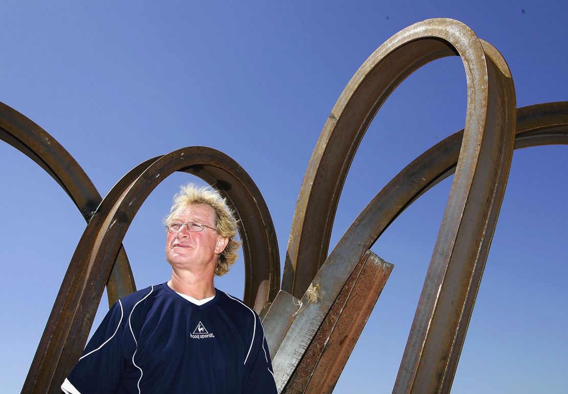 Rives poses next to one his creations at Sydney's Sculpture by the Sea exhibition in 2006. 