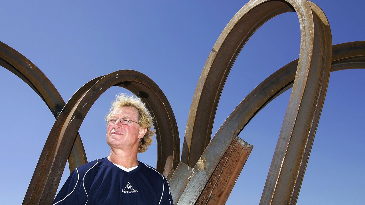 Rives poses next to one his creations at Sydney's Sculpture by the Sea exhibition in 2006. 