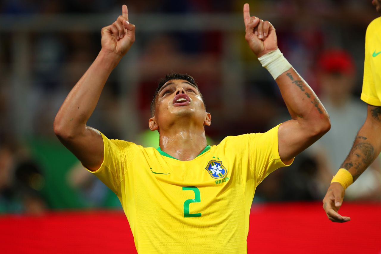 Brazilian defender Thiago Silva celebrates after his powerful header gave Brazil a 2-0 lead over Serbia on June 27. Brazil won Group E with two victories and a draw.