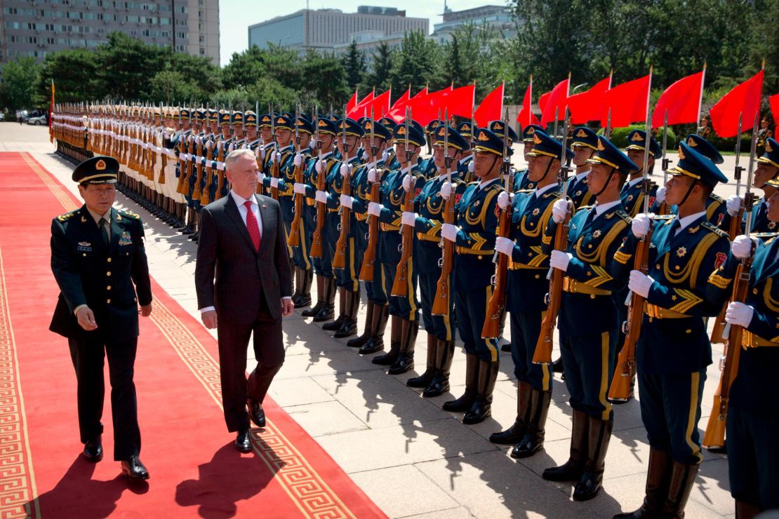 US Defence Secretary Jim Mattis and China's Defence Minister Wei Fenghe inspect and honour guard during a welcome ceremony at the Bayi Building in Beijing on June 27, 2018.
