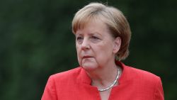 BERLIN, GERMANY - JUNE 18:  German Chancellor Angela Merkel and Italian Prime Minister Guiseppe Conte (not pictured) prepare to review a guard of honor upon Conte's arrival at the Chancellery on June 18, 2018 in Berlin, Germany. This is Conte's first visit to Germany since he recently took office.  (Photo by Sean Gallup/Getty Images)