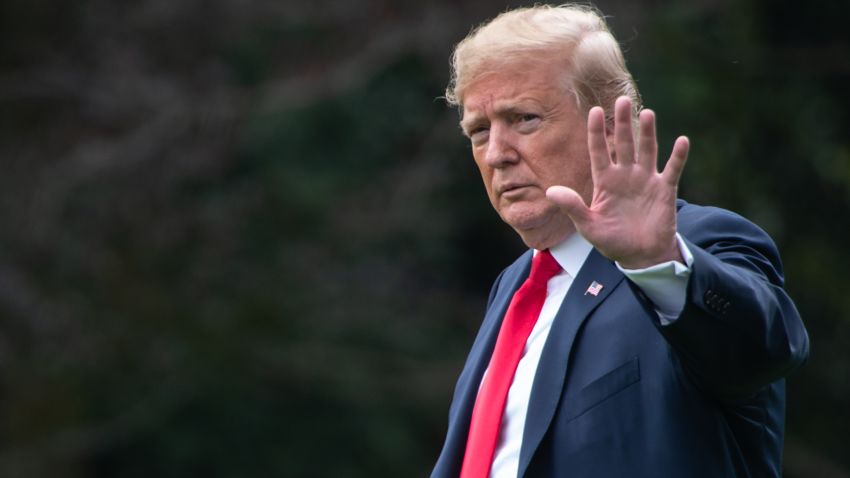 US President Donald Trump walks to board Marine One as he departs for North Dakota at the White House in Washington, DC, on June 27, 2018. 