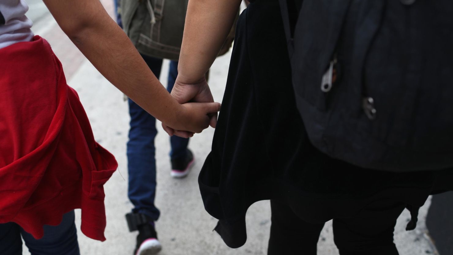 Central American immigrant families depart ICE custody, pending future immigration court hearings on June 11, 2018 in McAllen, Texas. Thousands of undocumented immigrants continue to cross into the U.S., despite the Trump administration's recent "zero tolerance" approach to immigration policy.  (Photo by John Moore/Getty Images)