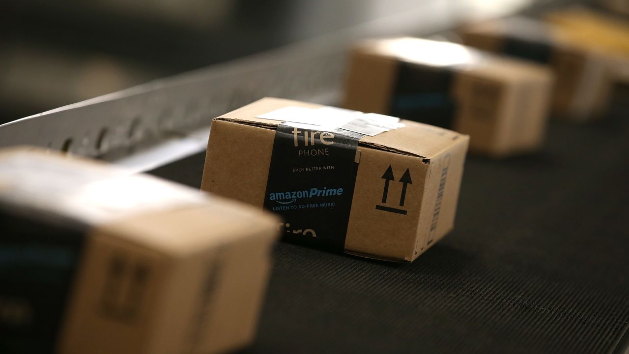 TRACY, CA - JANUARY 20:  Boxes move along a conveyor belt at an Amazon fulfillment center on January 20, 2015 in Tracy, California. Amazon officially opened its new 1.2 million square foot fulfillment center in Tracy, California that employs more than 1,500 full time workers as well as 3,000 Kiva robots that can fetch merchandise for workers and are capable of lifting up to 750 pounds. Amazon is currently using 15,000 of the robots spread over 10 fulfillment centers across the country.  (Photo by Justin Sullivan/Getty Images)