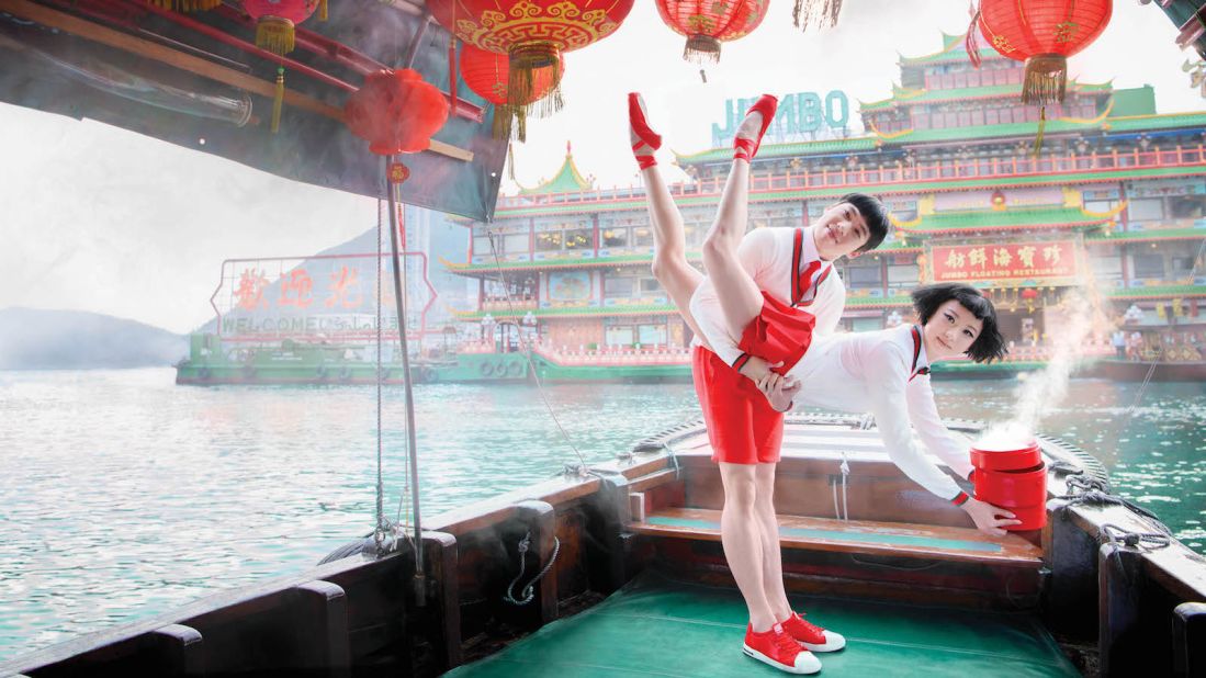 <strong>Jumbo Seafood: </strong>Dancers Leung Chunlong and Yang Ruiqi pose on a boat near Hong Kong's famous floating Jumbo Seafood restaurant, in Aberdeen. 