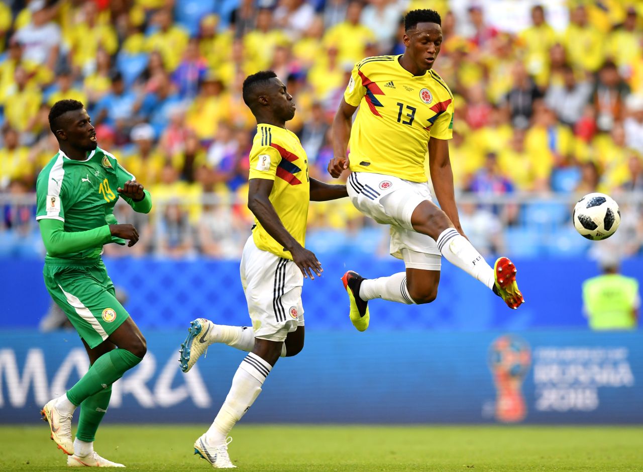 Colombian defender Yerry Mina controls the ball during a match against Senegal on June 28. Mina headed in a second-half goal to lift his team to a 1-0 victory -- and first place in Group H.