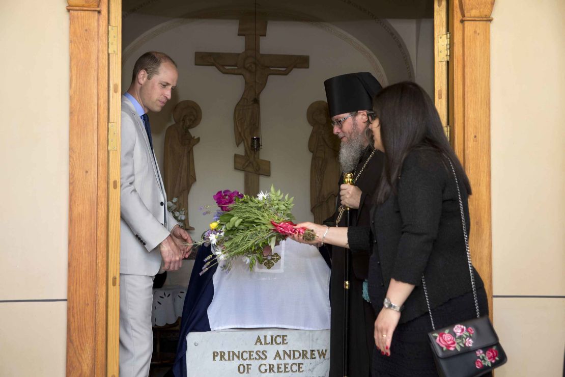 Britain's Prince William visits the grave of his great-grandmother, Princess Alice of Battenberg, during a visit to the Church of Mary Magdalene in Jerusalem on June 28, 2018. 
