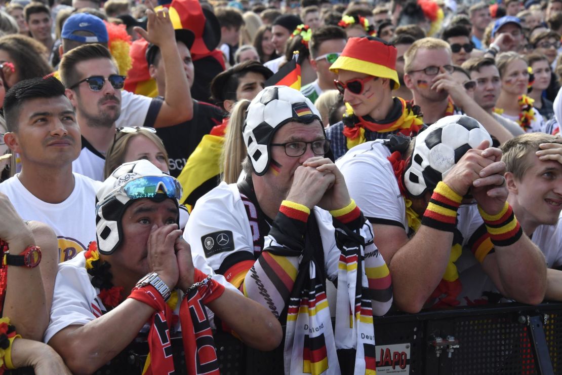 Germany fans watch in a fan park as their team crashes out of the World Cup.