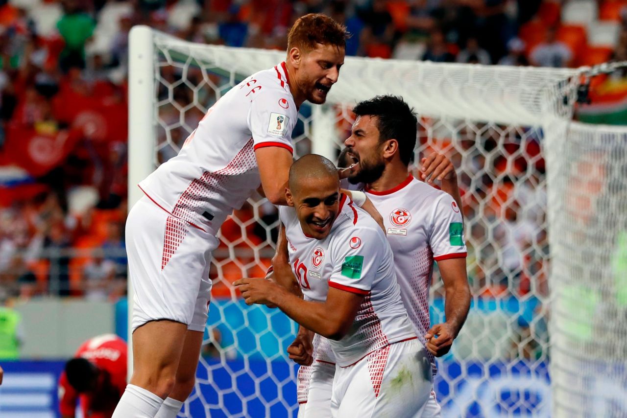 Tunisia's Wahbi Khazri, center, celebrates with his teammates after scoring the winning goal against Panama on June 28. Tunisia won 2-1.