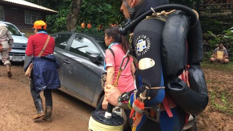 British divers are making rescue dives into the caves, but heavy rains have hampered their efforts.