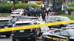 Police respond to a shooting in Annapolis, Maryland, June 28, 2018. - Several people were feared killed Thursday in a shooting at the building that houses the Capital Gazette, a daily newspaper published in Annapolis, a historic city an hour east of Washington. A reporter for the Capital Gazette, Phil Davis, tweeted that a "gunman shot through the glass door to the office and opened fire on multiple employees." He said several people were killed."There is nothing more terrifying than hearing multiple people get shot while you're under your desk and then hear the gunman reload," Davis said. (Photo by SAUL LOEB / AFP)        (Photo credit should read SAUL LOEB/AFP/Getty Images)