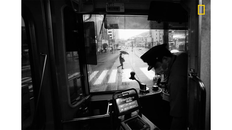 <strong>1st prize Cities category -- "Another rainy day in Nagasaki, Kyushu"</strong>: The first prize in the Cities category of the <a href="http://travel.nationalgeographic.com/photographer-of-the-year-2018/gallery/winners-all/1/" target="_blank" target="_blank">2018 National Geographic Travel Photographer of the Year Contest</a> is <a href="http://yourshot.nationalgeographic.com/profile/287196/" target="_blank" target="_blank">Hiru Kushina</a>. Kushina says: "This is a view of the main street from a tram in Nagasaki on a rainy day [...] The quiet streetscape seen through the front windshield of the tram somehow caught my attention."