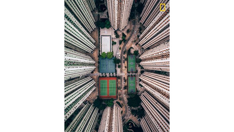 <strong>Cities honorable mention -- "Alone in the crowds"</strong>: The honorable mention in the Cities category of the <a href="http://travel.nationalgeographic.com/photographer-of-the-year-2018/gallery/winners-all/1/" target="_blank" target="_blank">2018 National Geographic Travel Photographer of the Year Contest</a> goes to to <a href="http://yourshot.nationalgeographic.com/profile/1401512/" target="_blank" target="_blank">Gary Cummins</a> who says "In this photo, I tried to bring the intense and stacked living conditions that Hong Kong is famous for into perspective for the viewer," says Cummins.