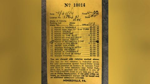 Ticket No. 10014 was written in 1974 for parking in a restricted zone; the fine was $2.