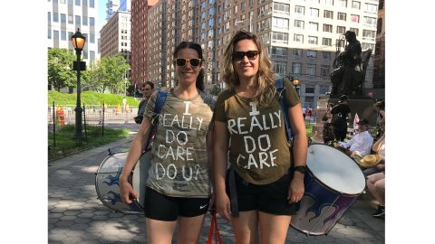 Annie Scott, left, and Fernanda Kock wear "I Really Do Care" shirts at Saturday's rally in New York.