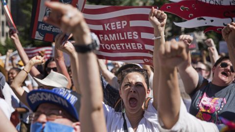 Protesters rally against the Trump administration's immigration policies Saturday in New York.