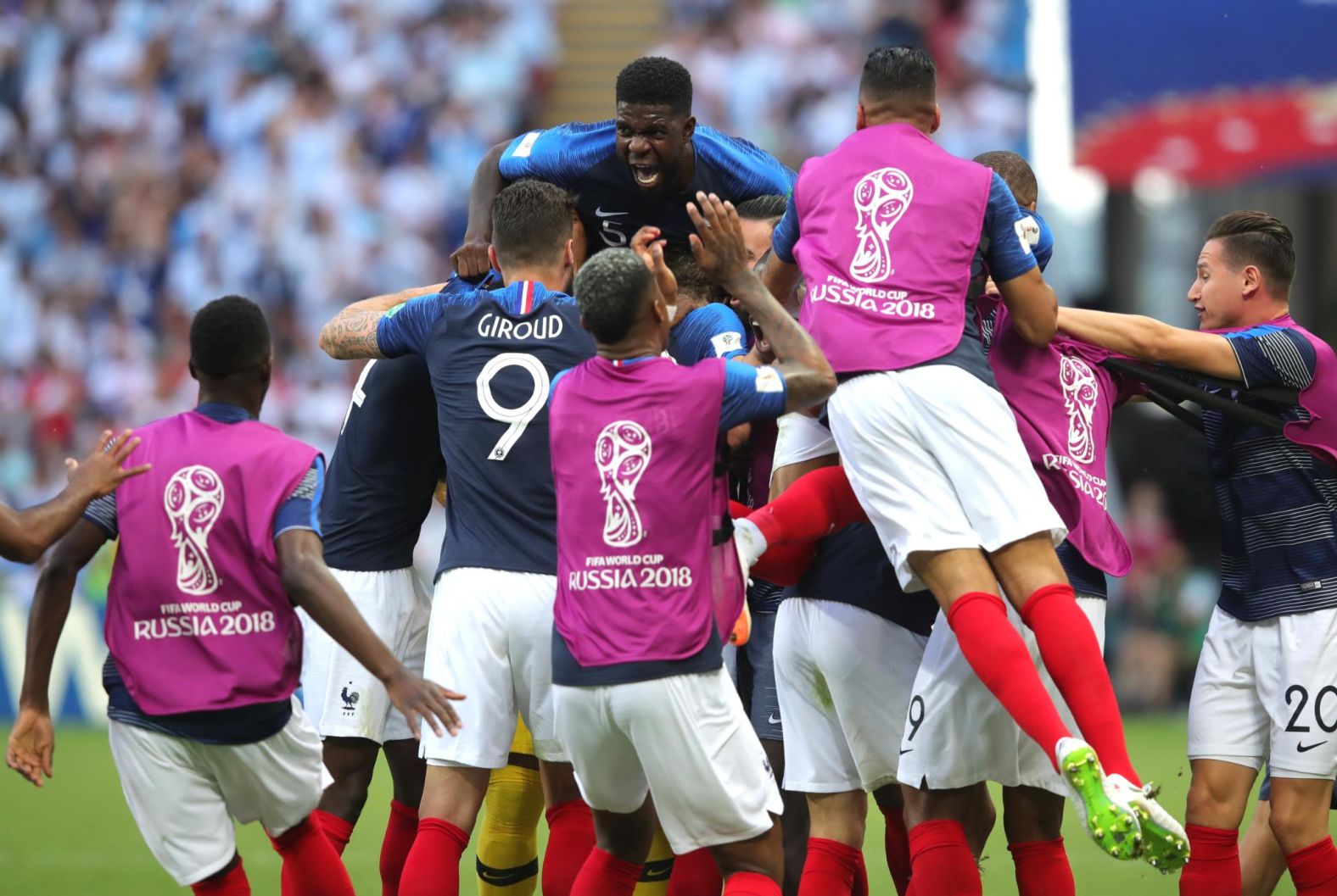 French players celebrate after Benjamin Pavard tied the match at 2-2.
