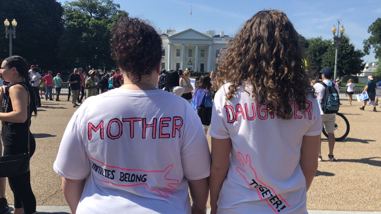 Stephanie Gruppo and her daughter Kylie attend a rally in Washington.