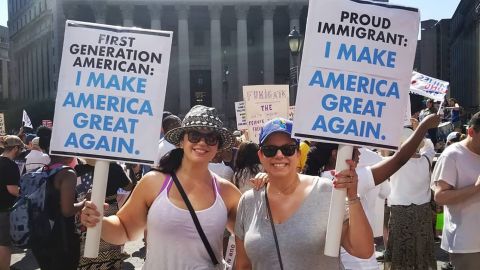 Elaine Alvarez, left, and sister Patty attend an immigration rally in New York.