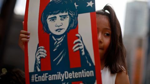 A girl takes part in a protest against the US immigration policies separating migrant families in Chicago.