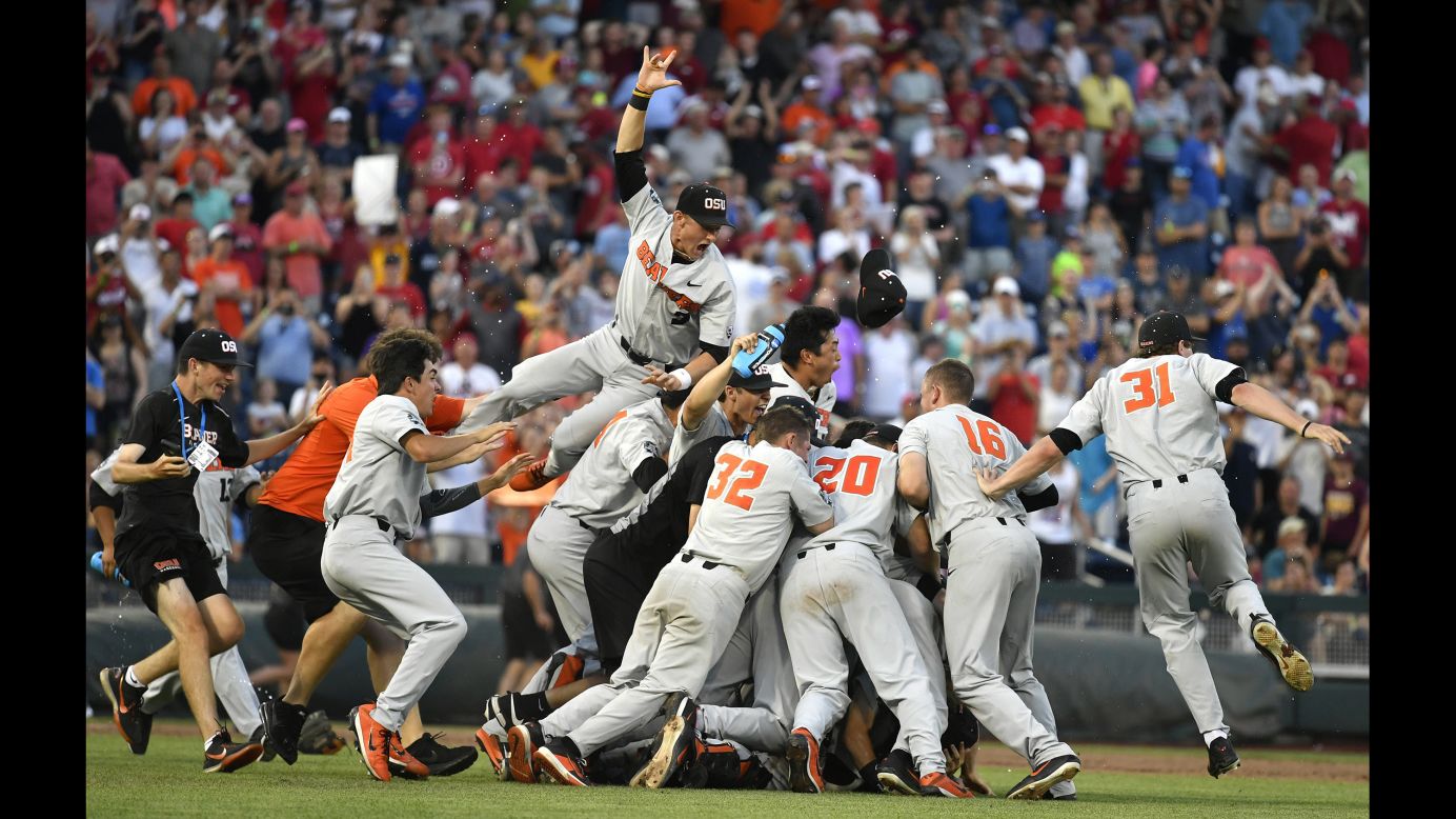 Oregon State players celebrate after winning the NCAA College World Series in Omaha, Nebraska, on Thursday, June 28. Oregon State defeated Arkansas 5-0 in Game 3.