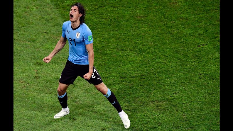 Uruguay's Edinson Cavani celebrates after scoring a goal during the World Cup match between Uruguay and Portugal on Saturday, June 30. <a  target="_blank">Portugal fell to a 2-1 defeat</a> against two-time champions Uruguay.