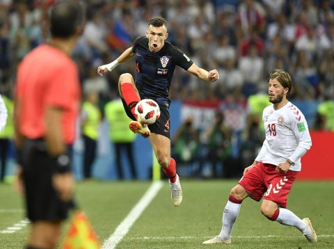 Croatia's Ivan Perisic stops the ball during the Denmark match.