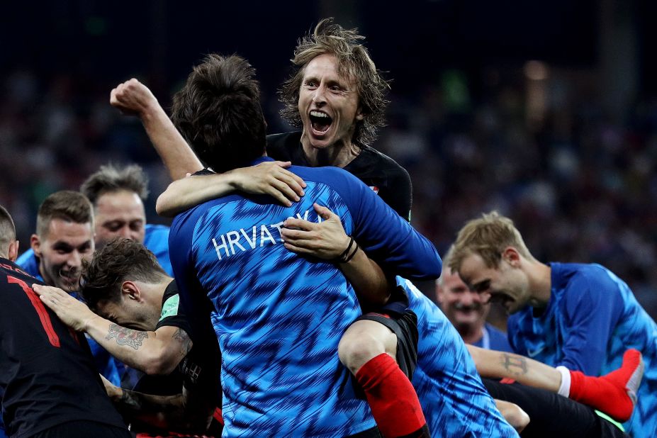 Croatia's Luka Modric celebrates with teammates after their victory over Denmark on July 1. Croatia won on penalties after the match ended 1-1. 