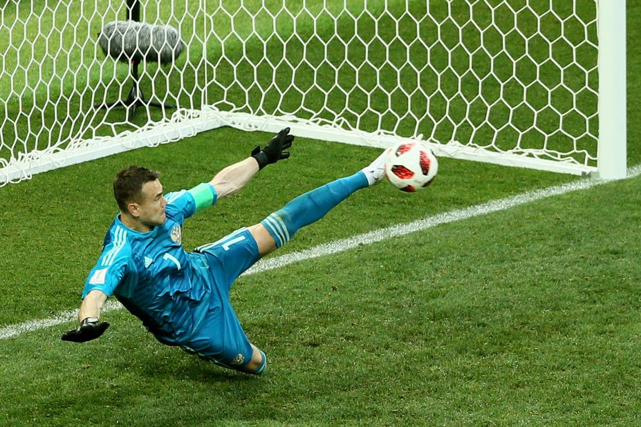 Goalkeeper Igor Akinfeev saves an Iago Aspas penalty to give Russia an upset victory over Spain in the round of 16. The match went to penalties after ending 1-1.