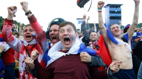 Russia fans celebrate after their national side beat Spain on penalties at the 2018 World Cup.