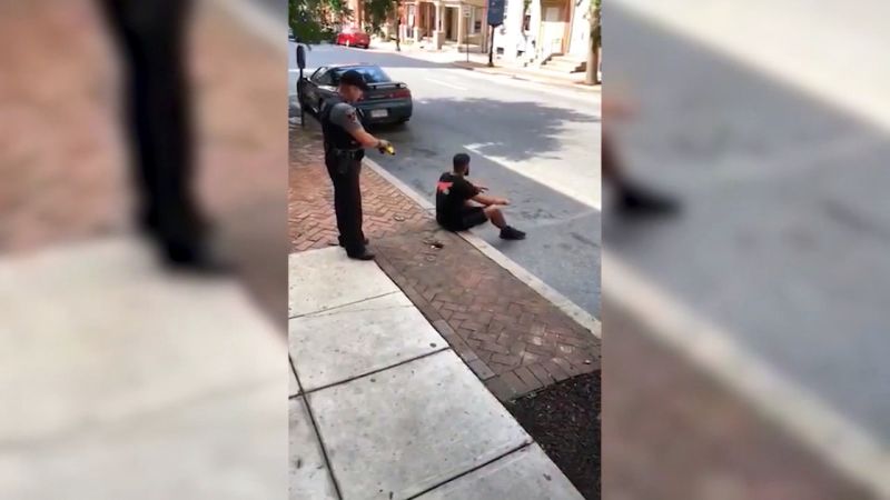 Cop Stun-guns Man Sitting On Sidewalk | CNN