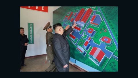 A photograph released by North Korean state media last year showing Kim inspecting an artist's rendition of the purported facility.