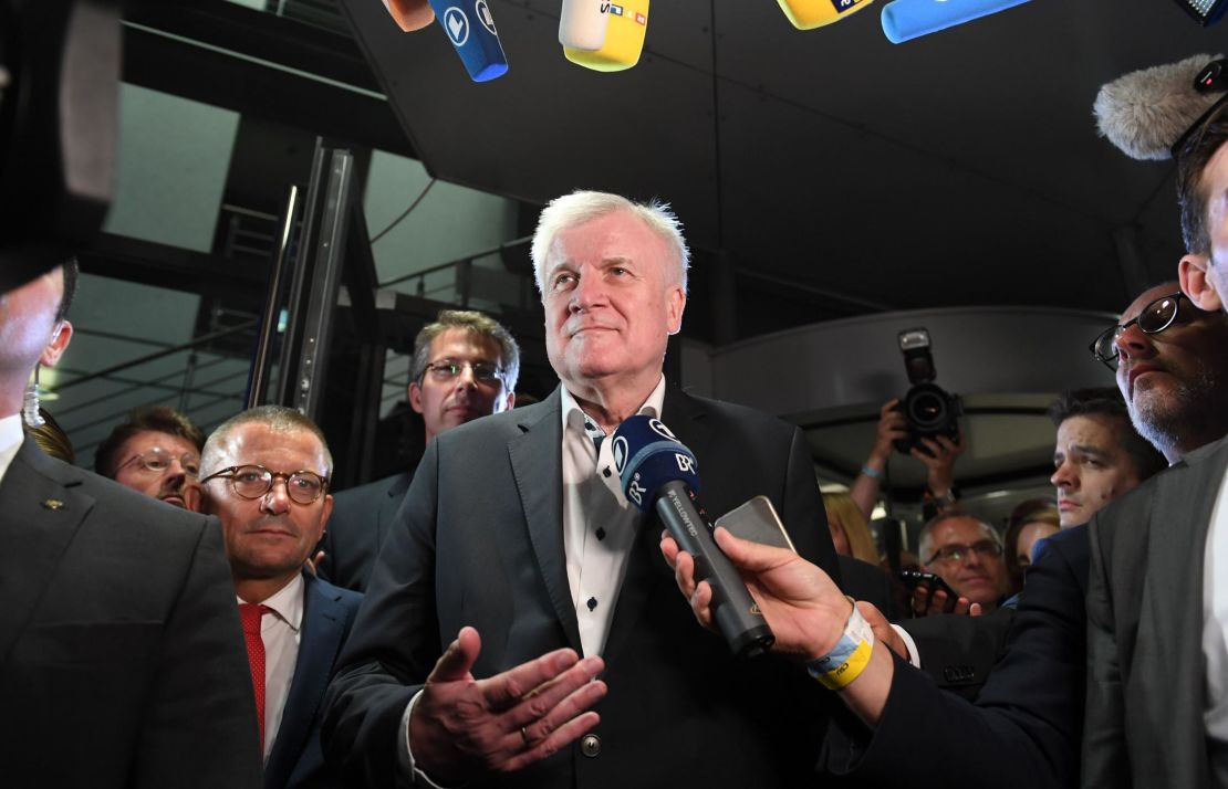 Horst Seehofer speaks to journalists early Monday after late-night talks with the CSU leadership.