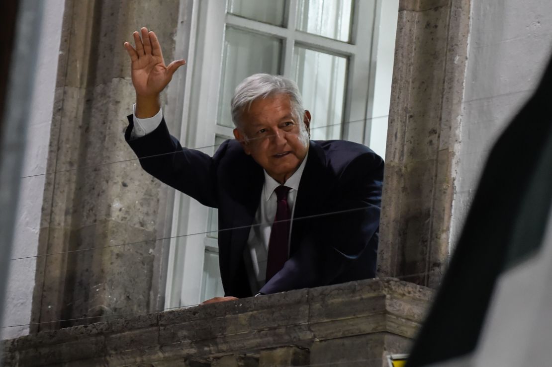 Andres Manuel Lopez Obrador waves to his supporters after an apparent victory in Mexico's general election on July 1, 2018.