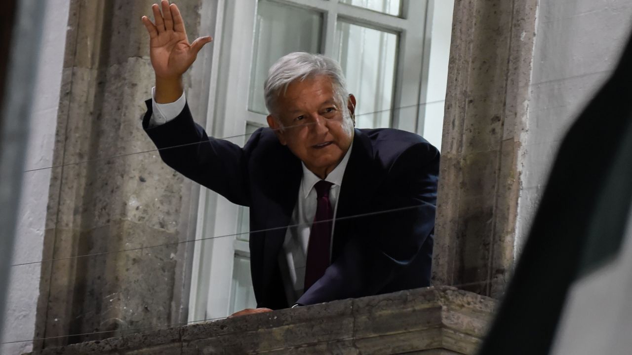 Andres Manuel Lopez Obrador waves to his supporters after an apparent victory in Mexico's general election on July 1, 2018.