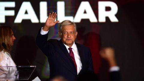 Newly elected Mexican President Andrés Manuel López Obrador greets his supporters in Mexico City on July 1, 2018. (Photo credit PEDRO PARDO/AFP/Getty Images)