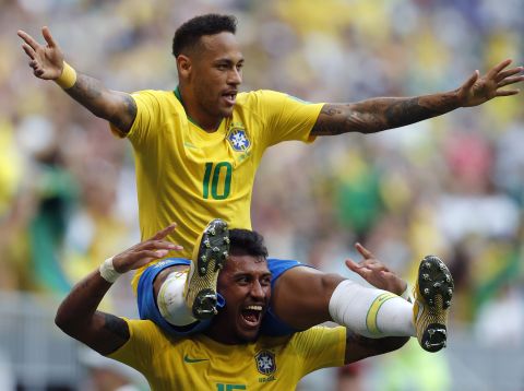Neymar is held on Paulinho's shoulders after the first goal.