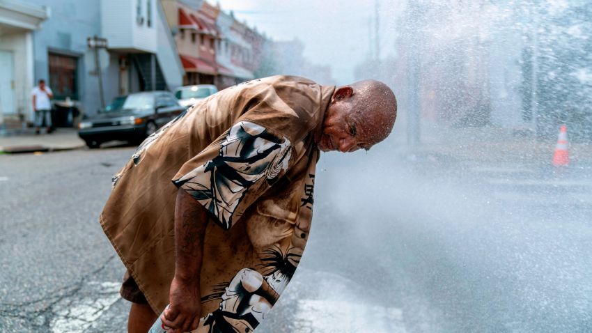 PHILADELPHIA, PA - JULY 01: Eduardo Velev cools off in the spray of a fire hydrant during a heatwave on July 1, 2018 in Philadelphia, Pennsylvania. An excessive heat warning has been issued in Philadelphia and along the East Coast as hot and humid weather hits the region this week.  (Photo by Jessica Kourkounis/Getty Images)