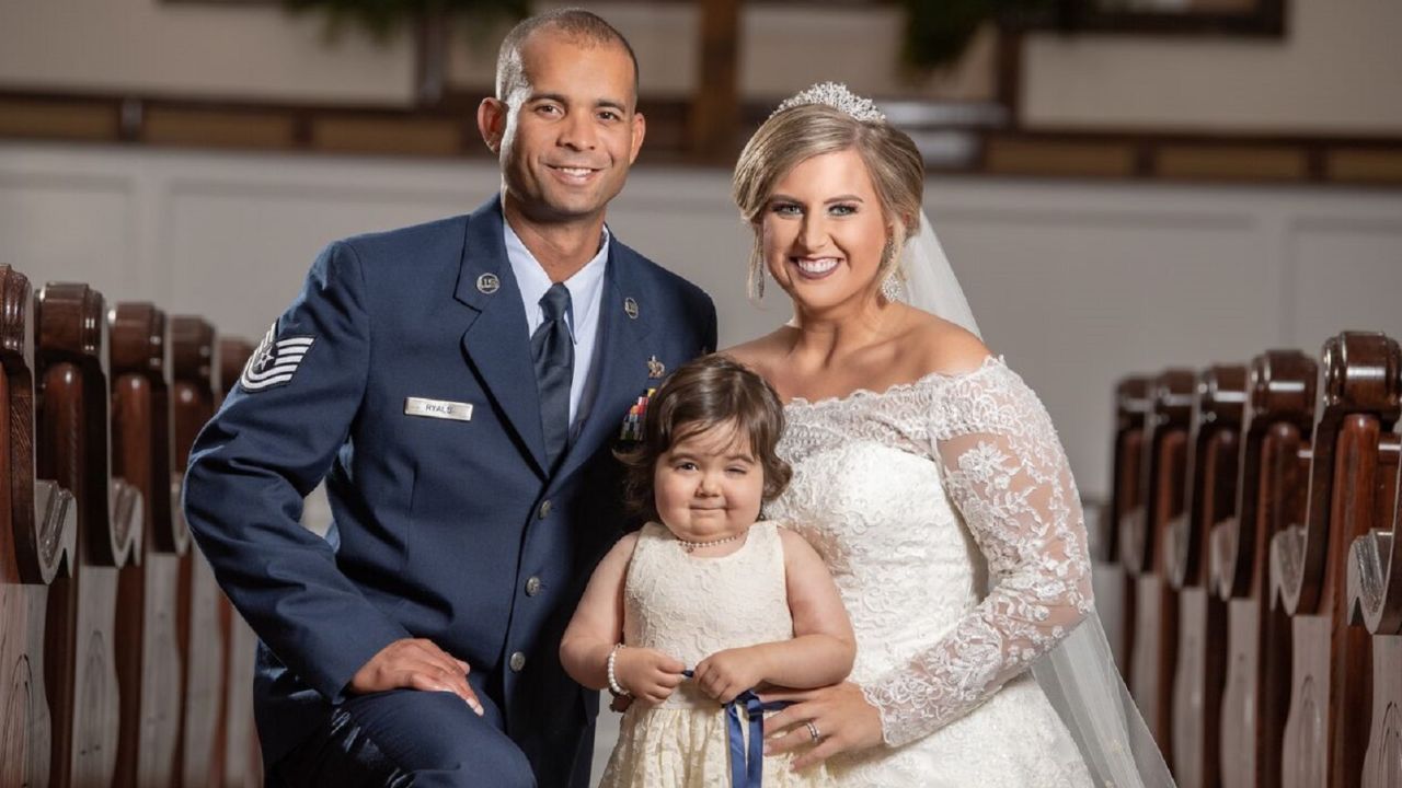 Hayden Hatfield Ryals, and her husband, Adrian Ryals, with Skye.