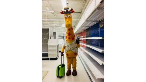 Geoffrey the Giraffe prepares to leave an empty Toys 'R' Us store. 