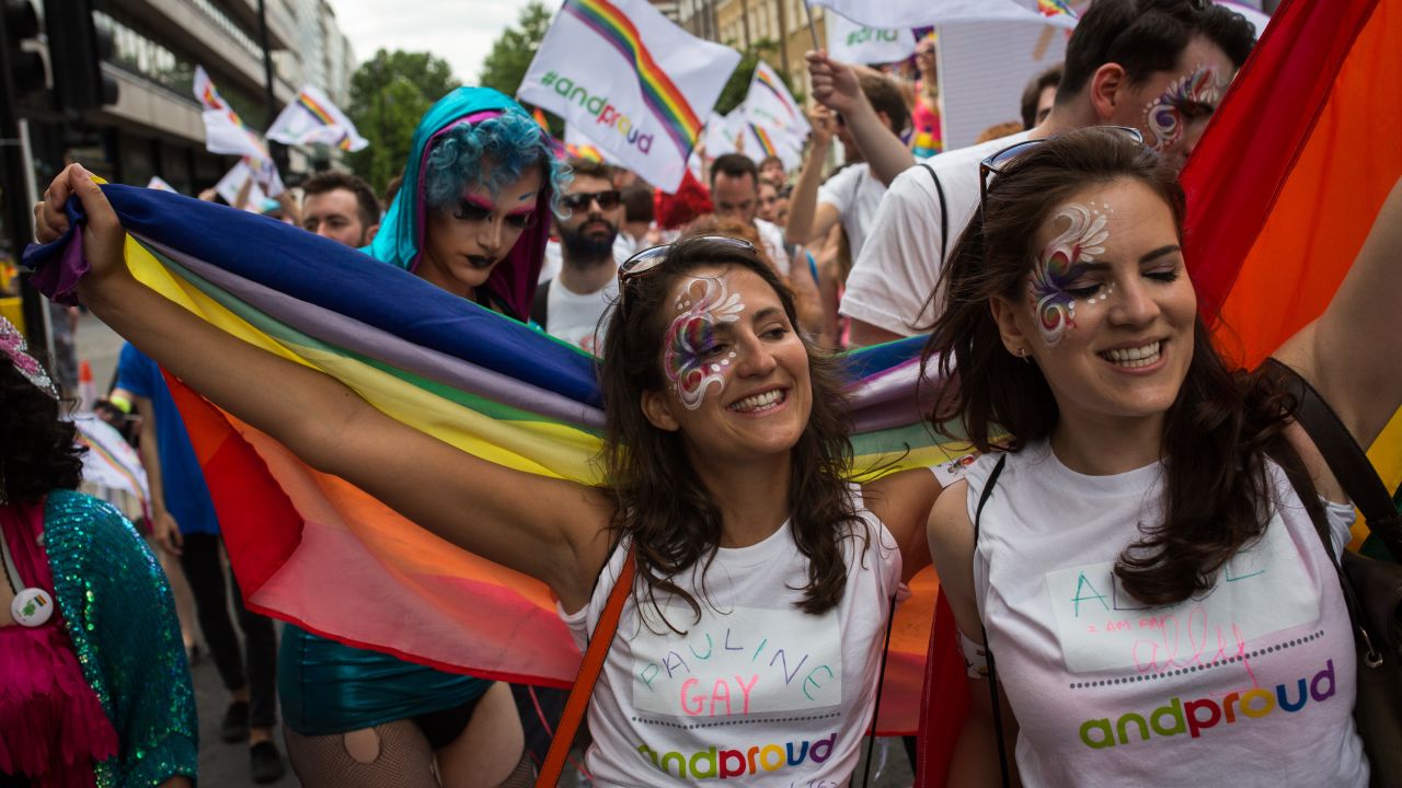 People take part in the annual Pride in London parade on June 27, 2015.