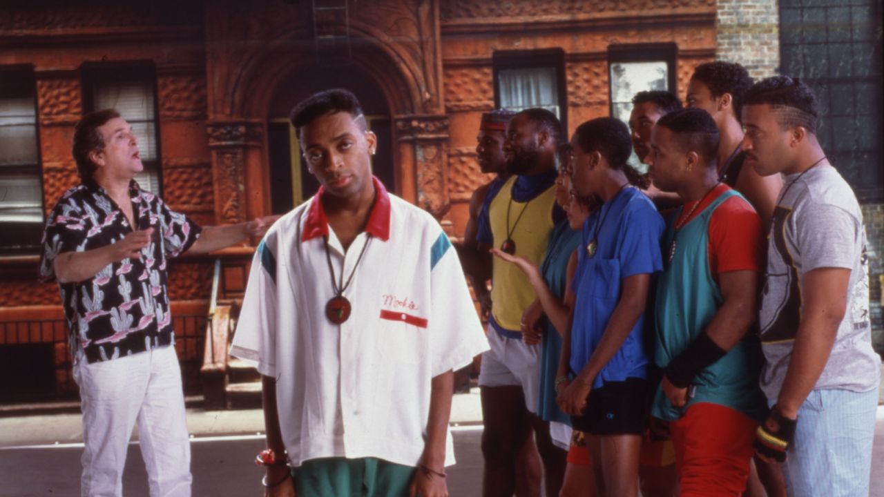 Portrait of American film director and actor Spike Lee (center) on the set of his film 'Do the Right Thing,' New York, 1989. Among the cast behind him is actor Danny Aiello (left). (Photo by Anthony Barboza/Getty Images)
