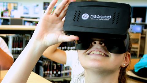 A student tries on a virtual reality headset.