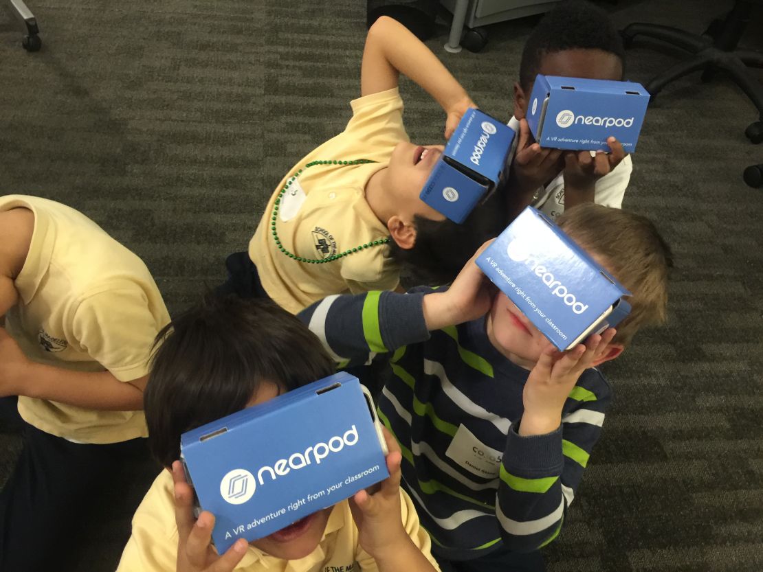 Children use Nearpod VR headsets.