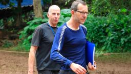 Richard Stanton, left, and John Volanthen arrive in Mae Sai, Chiang Rai province, in northern Thailand, Tuesday, July 3, 2018. The 12 boys and soccer coach found in a partially flooded cave in northern Thailand after 10 days are mostly in stable medical condition and have received high-protein liquid food, officials said Tuesday, though it is not known when they will be able to go home. (AP Photo)