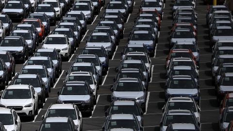 Brand new cars sit in a lot at the Auto Warehousing Company near the Port of Richmond on May 24 in Richmond, California.