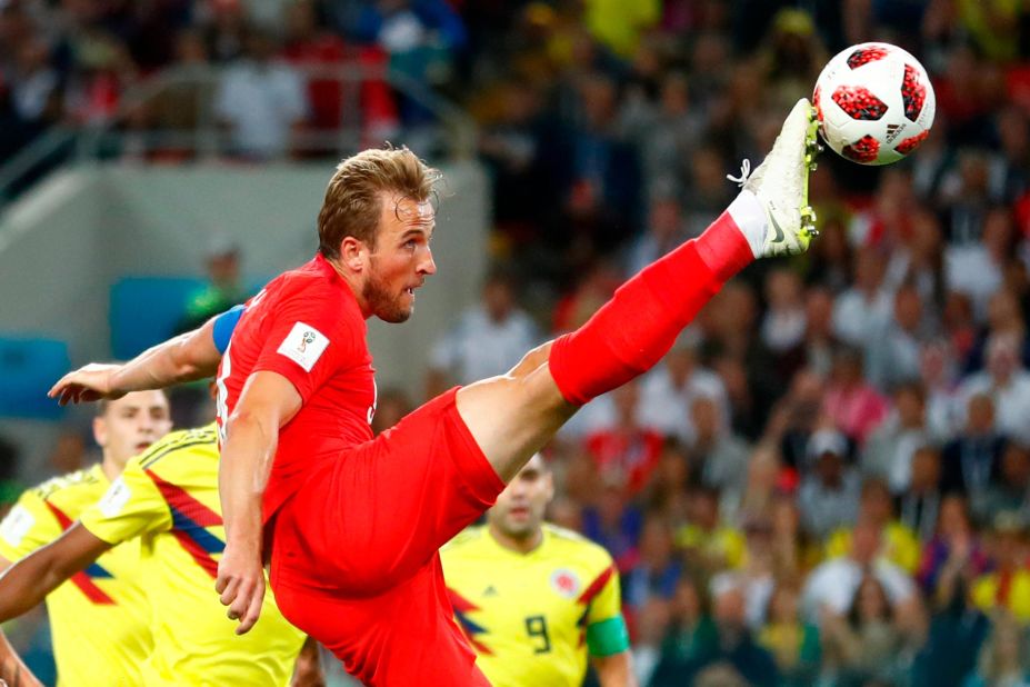 England's Harry Kane tries to control the ball against Colombia. He scored a penalty during regulation time. It was his tournament-leading sixth goal.