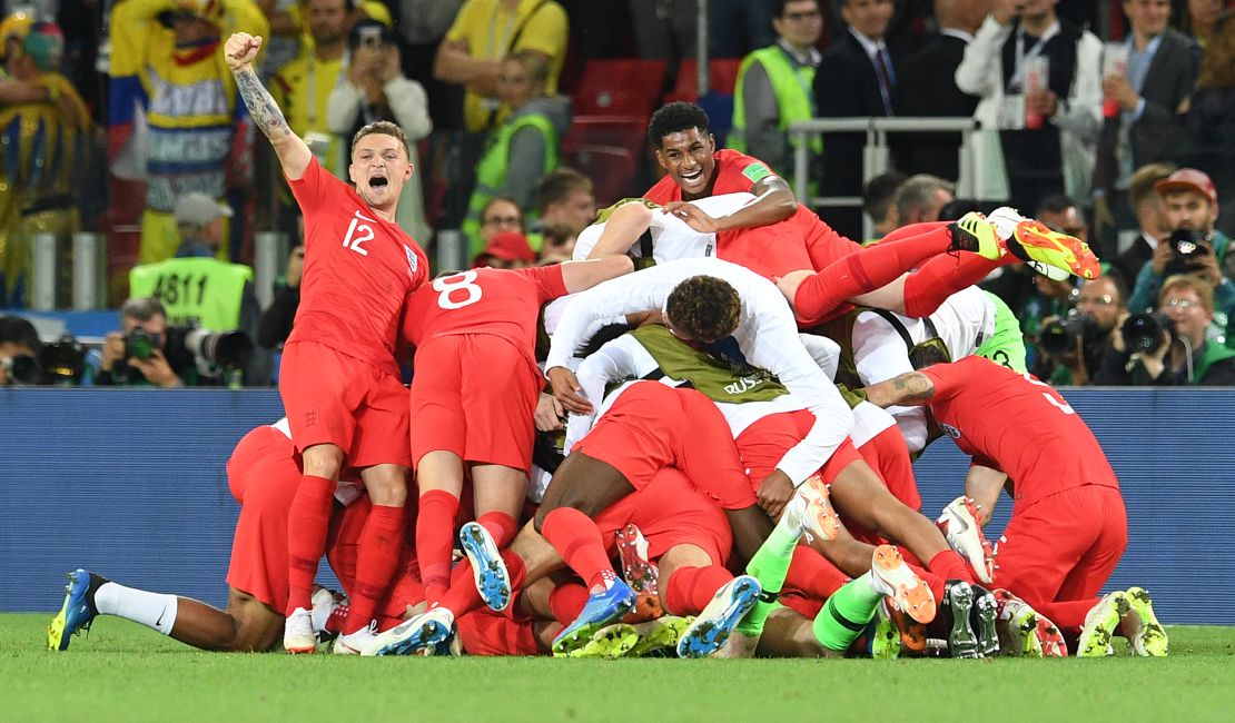 England players celebrate after winning the penalty shootout against Colombia.